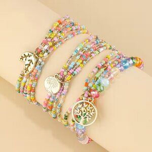 Beaded Stretch Bracelet With Gold Leaves